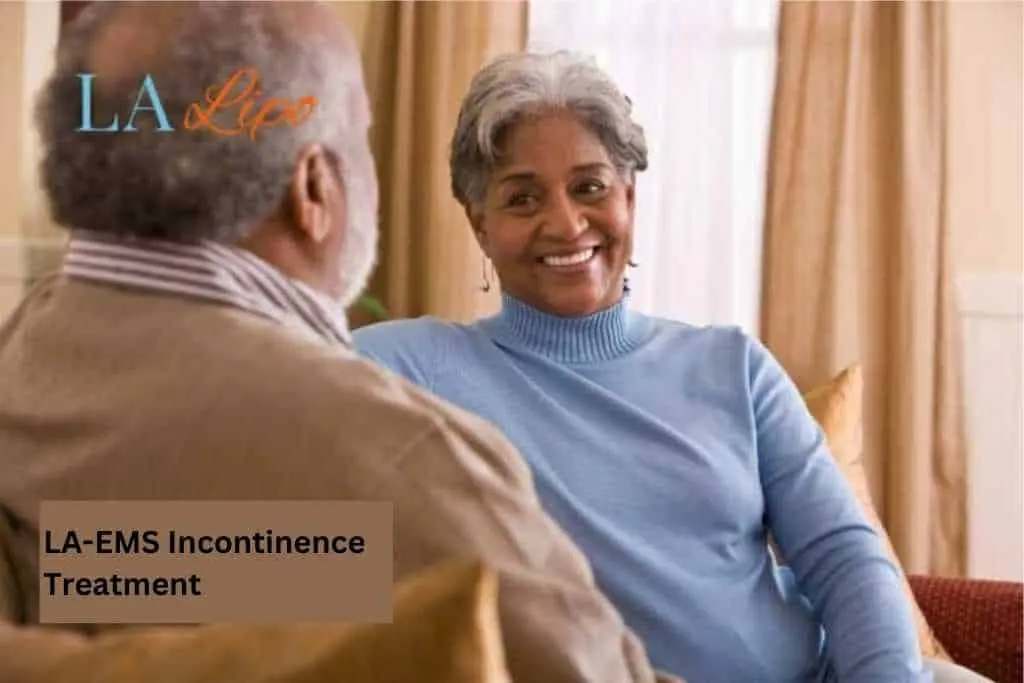 Couple sat smiling at each other - LA-EMS treatment Kent
