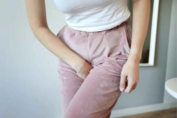 older woman running to the toilet because of urinary incontinence Kent